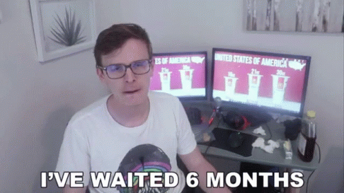 Man Sitting in Front of Two Monitors Saying I've Waited 6 Months
