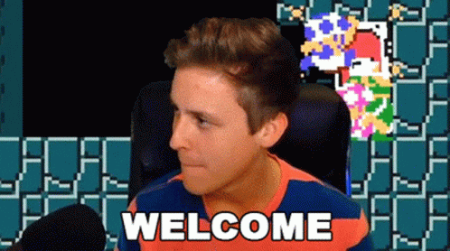 Man Sitting in Front of Video Game Welcome