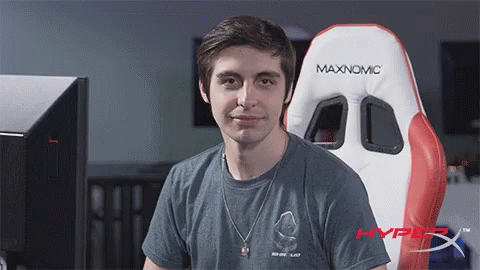 Man Sitting In Maxnomic Chair With HyperX Logo GIF