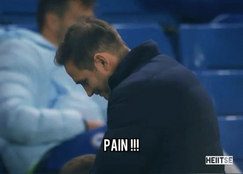 Man Sitting In Stadium Saying Pain GIF