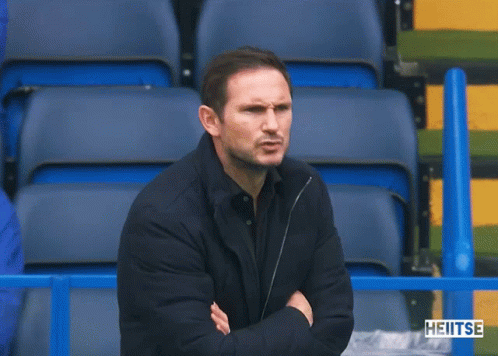 Man Sitting In Stadium With Word Heitse GIF