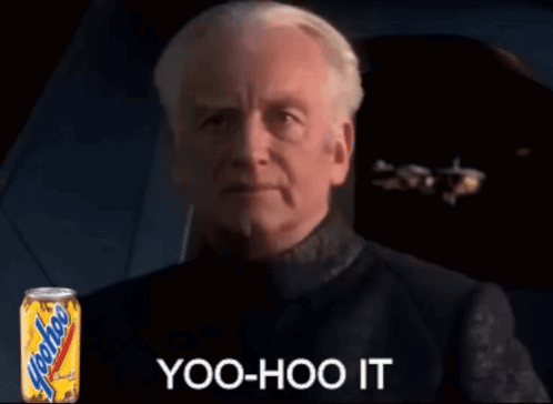 Man Sitting Next to Yoohoo Can