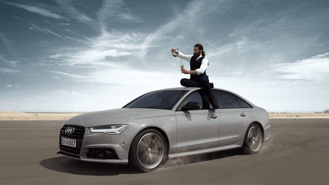 Man Sitting On Audi Roof GIF