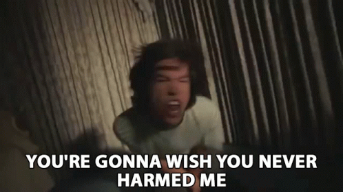 Man Sitting on Bed Hands on Chest You're Gonna Wish You Never Harmed Me