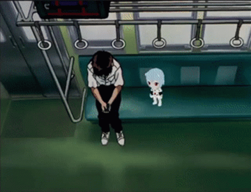 Man Sitting on Bench Next to Stuffed Animal