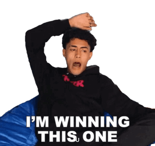 Man Sitting On Blue Bean Bag Saying Im Winning GIF
