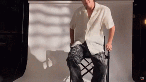 Man Sitting On Chair GIF