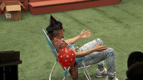 Man Sitting On Chair Outside GIF