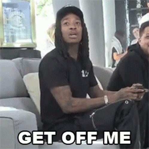 Man Sitting On Couch Get Off Me GIF