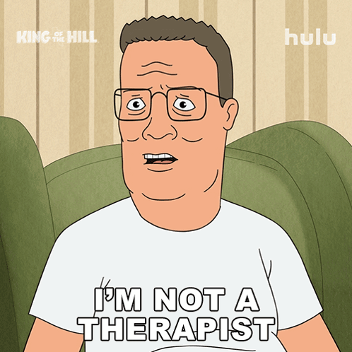 Man Sitting on Couch I'm Not a Therapist