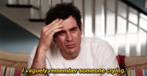Man Sitting on Couch Remembering Crying