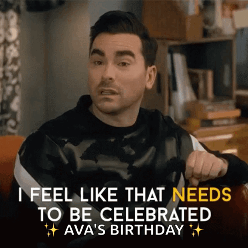 Man Sitting On Couch Saying Celebrate GIF