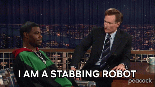 Man Sitting On Couch Saying I Am A Stabbing Robot GIF