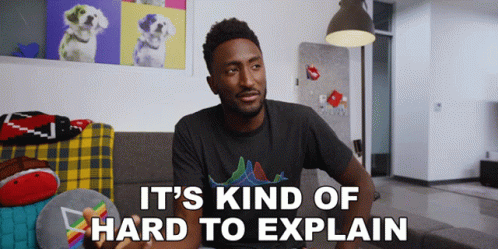 Man Sitting On Couch Saying It's Kind Of Hard To Explain GIF