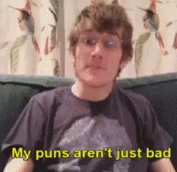 Man Sitting on Couch Saying My Puns Aren't Just Bad