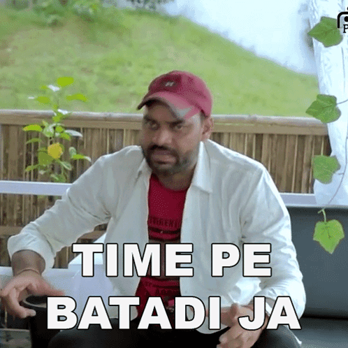 Man Sitting On Couch Saying Time Pe Batadi Ja GIF