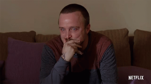 Man Sitting on Couch Watching Netflix