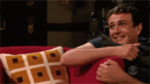 Man Sitting On Couch With CBS Logo Watch GIF