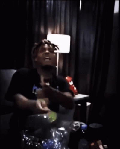 Man Sitting On Couch With Chips GIF