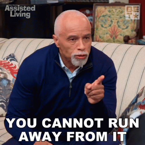 Man Sitting On Couch You Cannot Run Away From It GIF