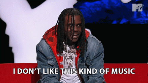 Man Sitting on Red Couch Saying I Don t Like This Music