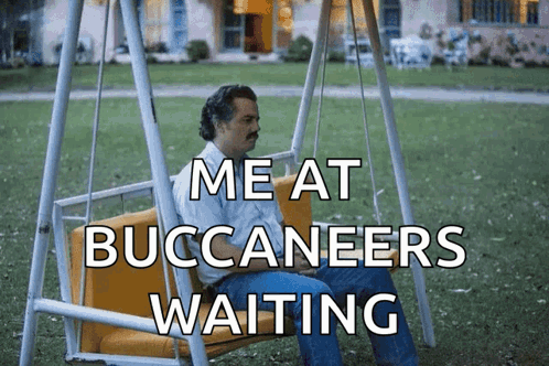 Man Sitting on Swing Me at Buccaneers Waiting