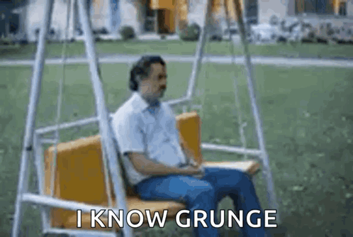 Man Sitting on Swing Saying I Know Grunge