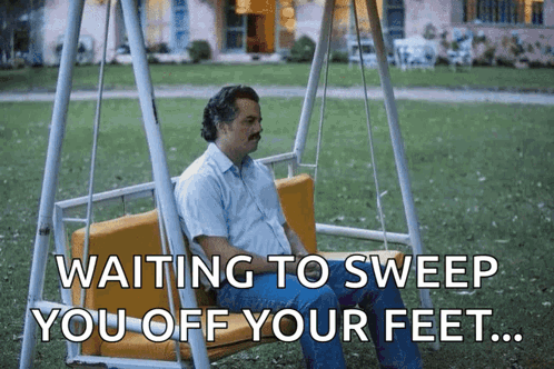 Man Sitting on Swing Waiting to Sweep You Off Feet