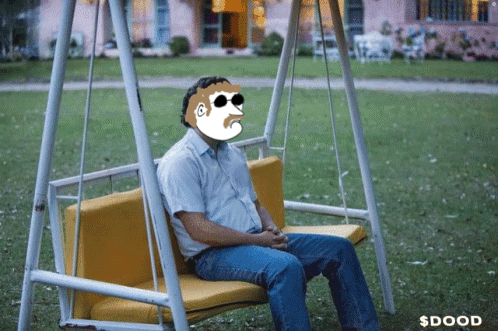Man Sitting on Swing with Cartoon Face
