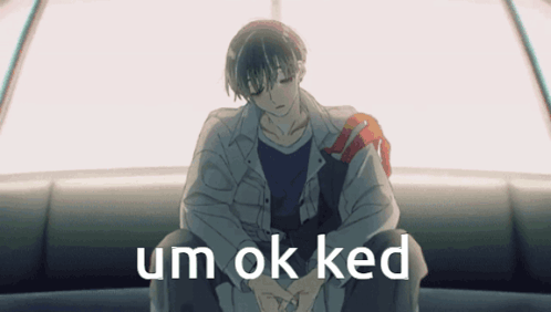 Man Sitting Saying Um OK Ked