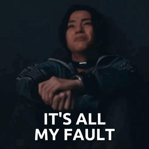 Man Sitting With Fault Words GIF