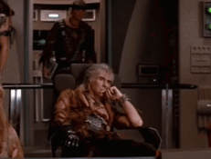 Man Sitting With Hands On Chin GIF