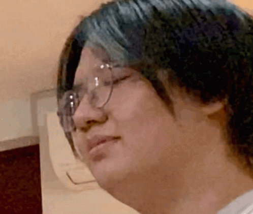 Man Slapping Face By A Fish GIF