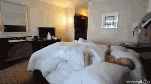 Man Sleeping In Hotel Room With Reversegif.com GIF