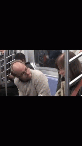 Man Sleeping Next to Woman with McDonald's Ad