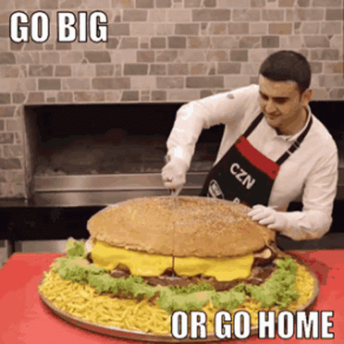 Man Slicing Huge Burger GIF