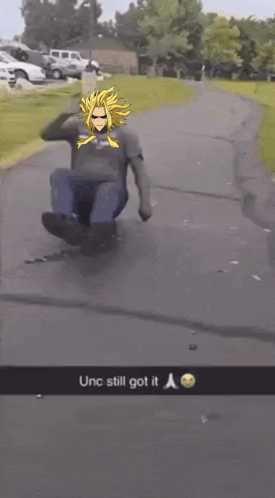 Man Sliding Down Sidewalk In Cartoon Shirt GIF