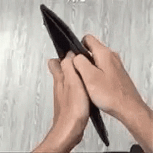 Man Slowly Looking At His Wallet And There Is No Cash GIF