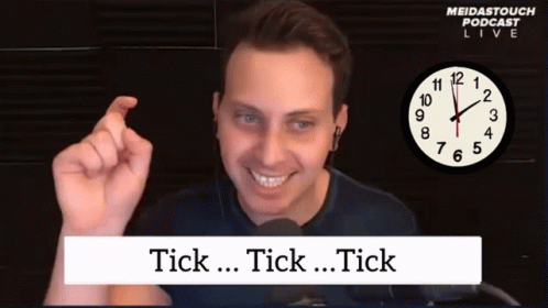 Man Smiling Beside Clock Saying Meidastouch Podcast Live