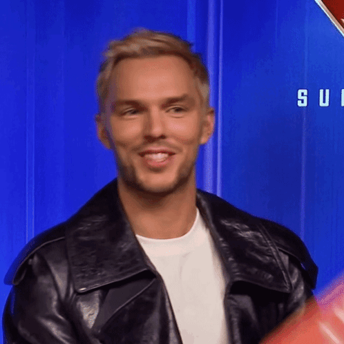 Man Smiling in Black Leather Jacket
