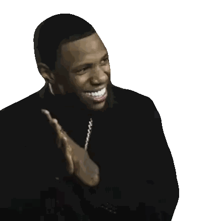 Man Smiling in Black Suit