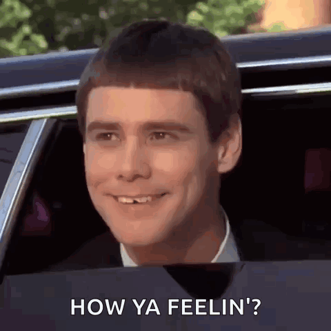 Man Smiling in Car Saying How Ya Feelin