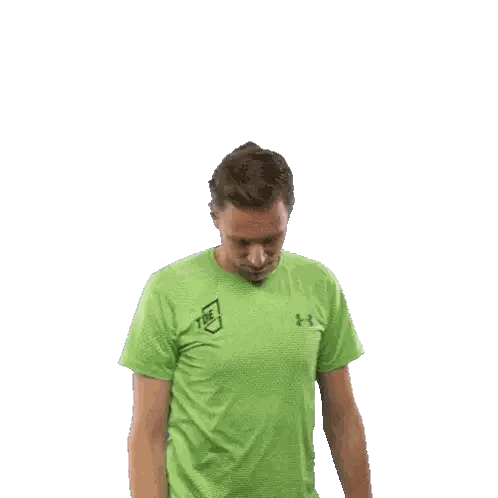 Man Smiling in Green Shirt