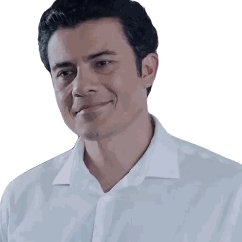 Man Smiling in White Shirt