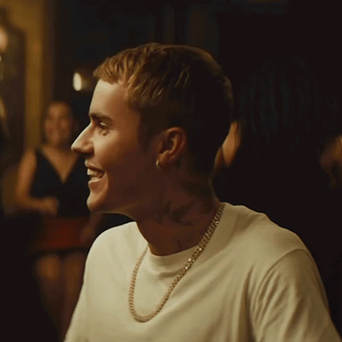 Man Smiling In White T-Shirt And Gold Chain GIF