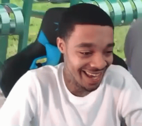Man Smiling on Roller Coaster
