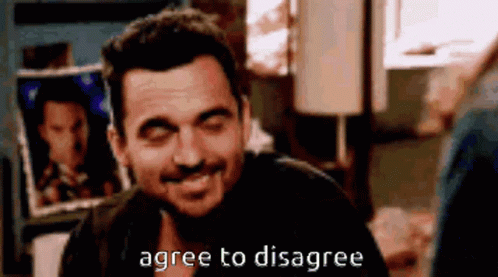 Man Smiling Saying Agree to Disagree
