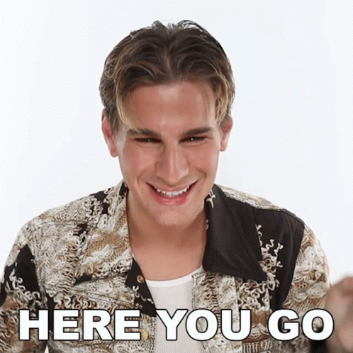Man Smiling Saying Here You Go GIF