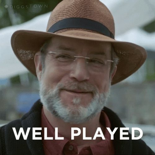Man Smiling Saying Well Played GIF