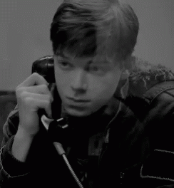 Man Smiling Talking on Phone